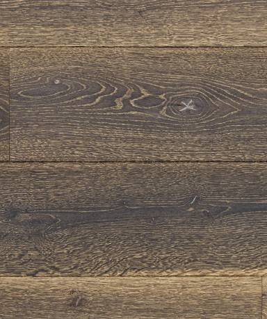 Parquet bois foncé texturé, lames larges. Grain et noeuds visibles. Aspect vieilli et brut.