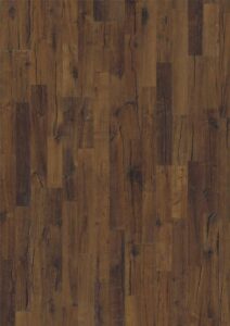 Plancher bois foncé brun, aspect vieilli avec grain et variations de couleur visibles.