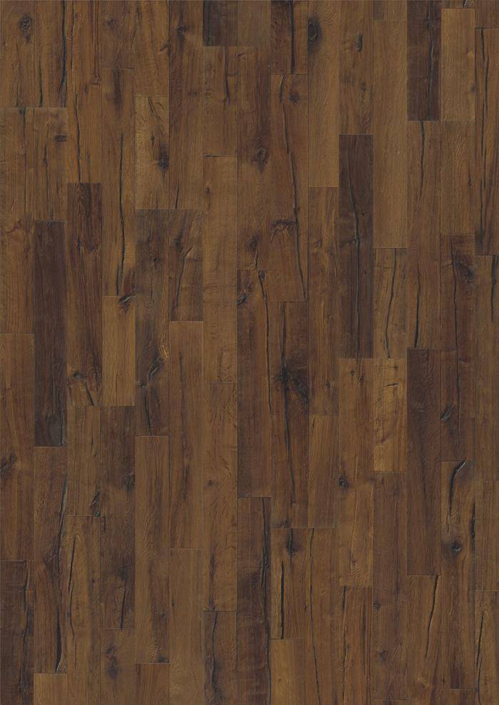 Plancher bois foncé brun, aspect vieilli avec grain et variations de couleur visibles.